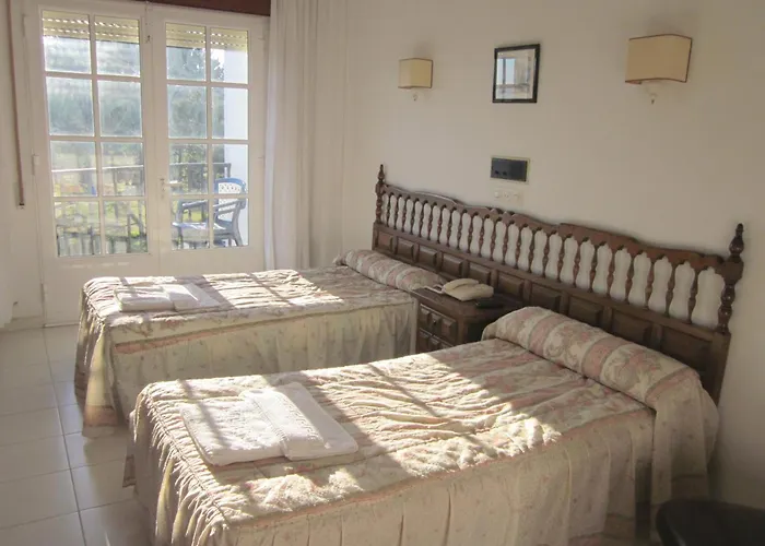 Отель Sixto Санхенхо